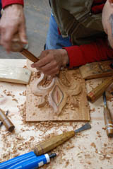 David Calvo showing wood carving techique to students david calvo teaching wood carving