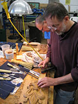 Wood carving student practices technique Wood Carving student working on technique
