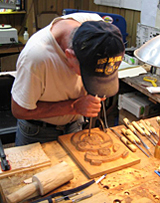 Wood carving student learning carving wood carving student working on project