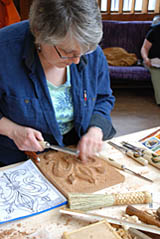 Student learning wood carving technique Student learning wood caring